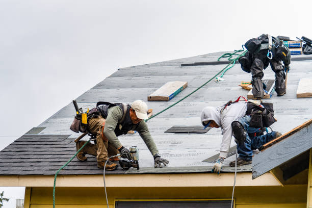 Professional Gutter Installation technician working in Redwood Estates, CA